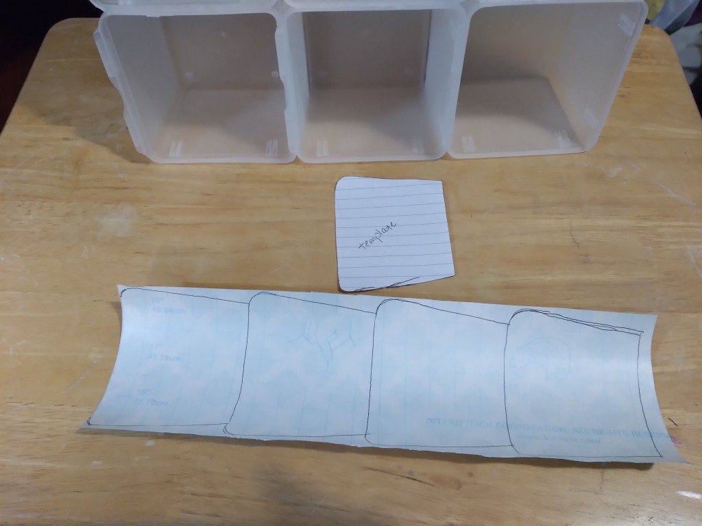 I measured and laid the contact paper inside each bin for some decorative flare.