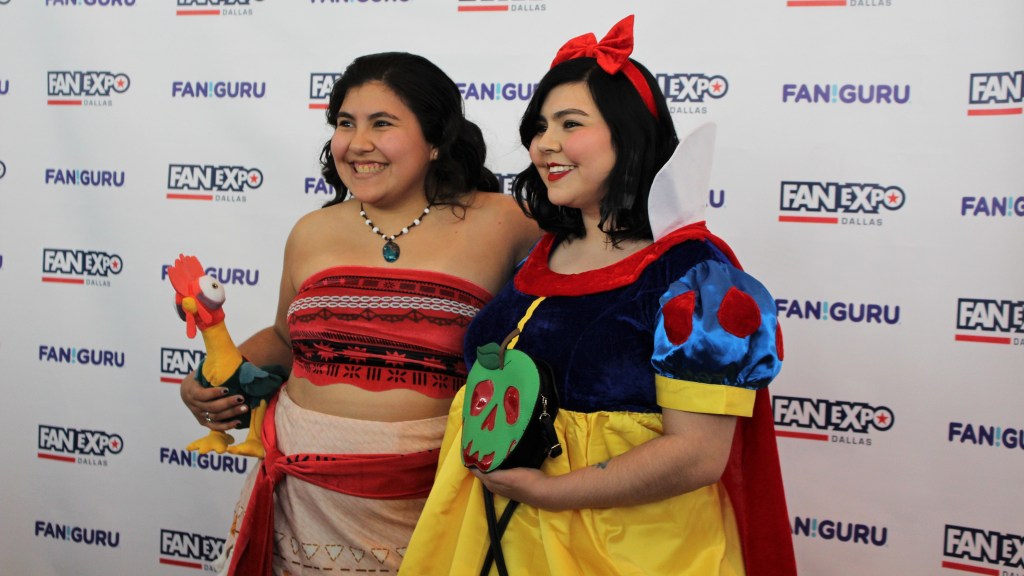 Moana and Snow White cosplayers