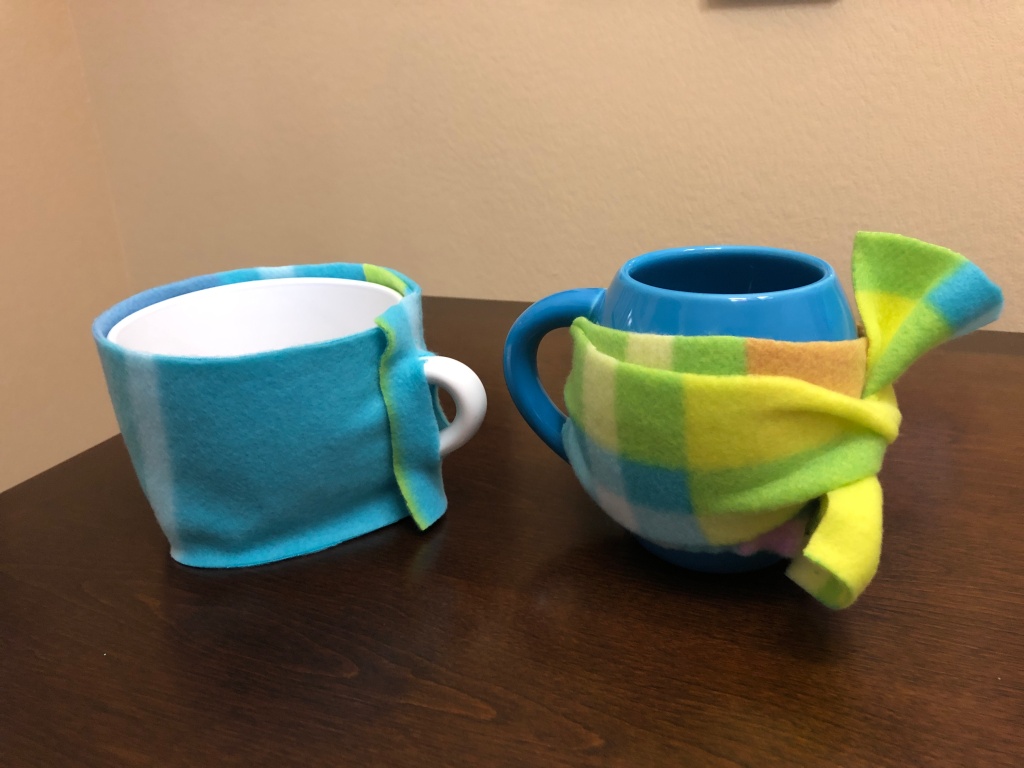 Two mugs with DIY fleece koozies