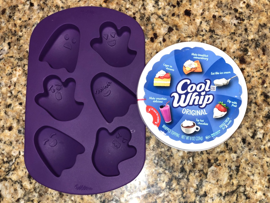 A ghost silicon tray and Cool Whip on a marble kitchen top 