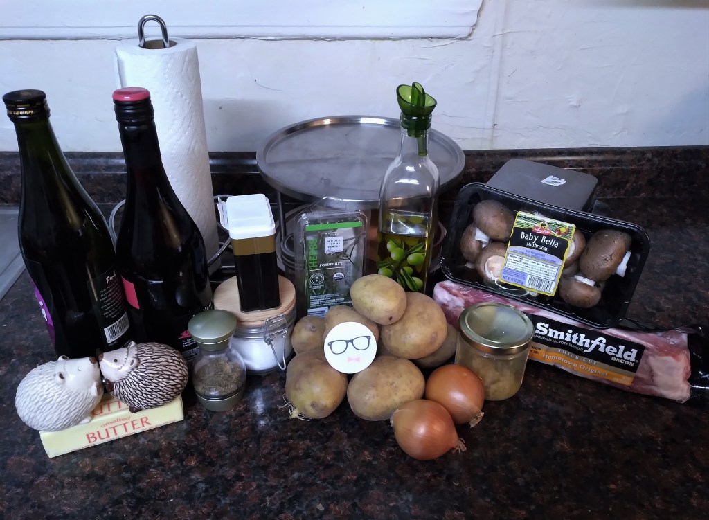 Ingredients needed to make the Gotcha! pork roast recipe from the anime series, "Food Wars": potatoes, onions, mushrooms, and more