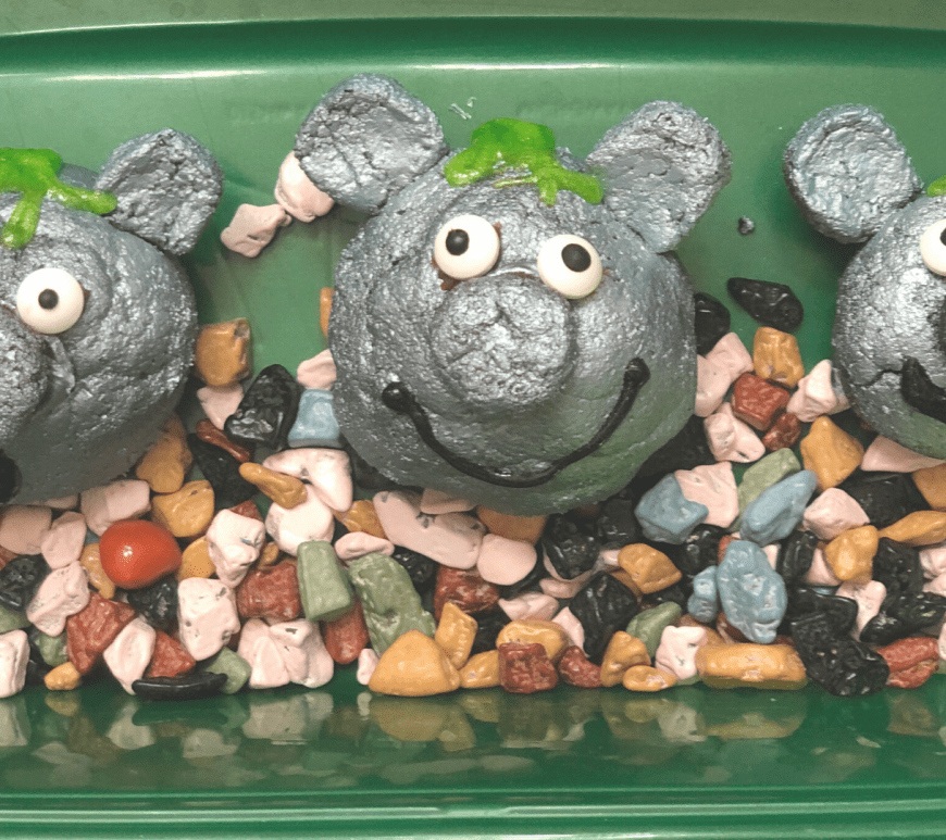 DIY Frozen 2 troll cake balls with chocolate rocks in a container