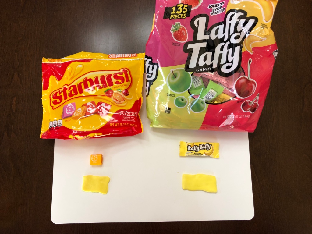 Roll out your lemon Starburst candy and your banana Laffy Taffy candy. The Starburst and Laffy Taffy are other candies you can use to make your Wonder Woman candy topper.