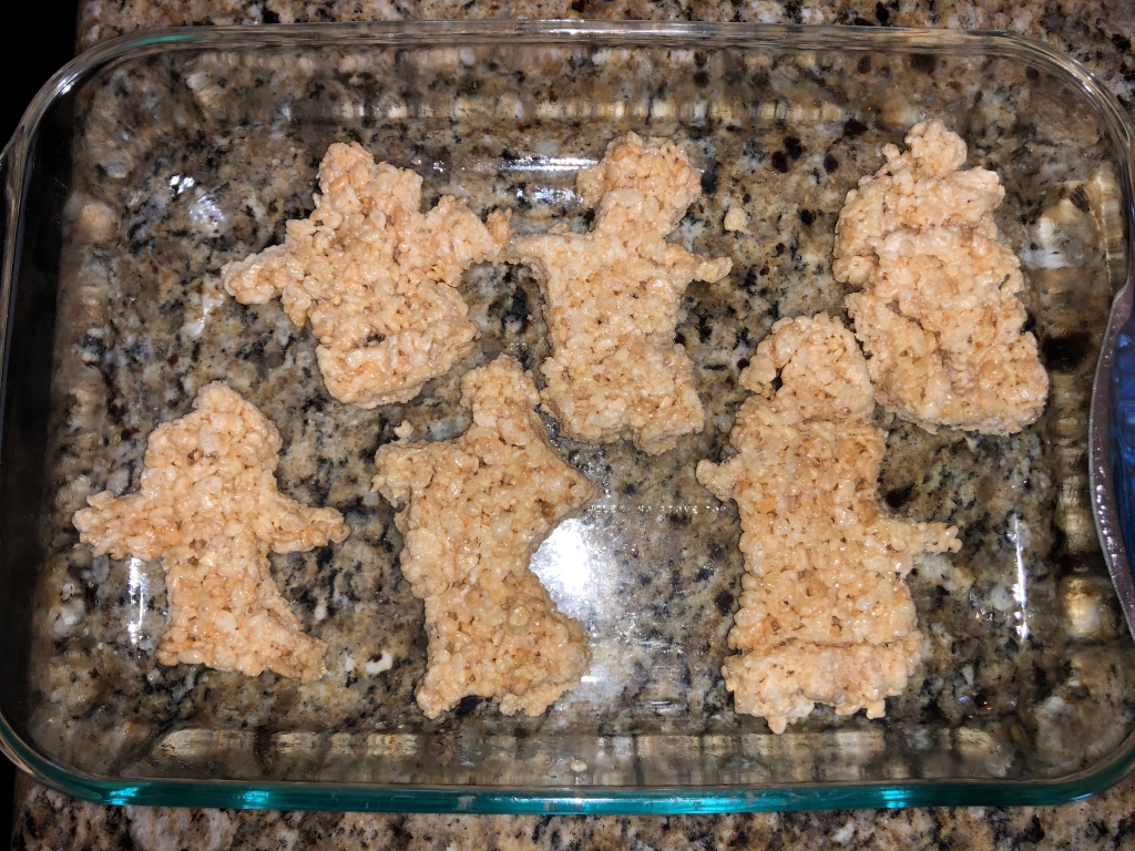 Hand-molded ghost-shaped Rice Krispies treats
