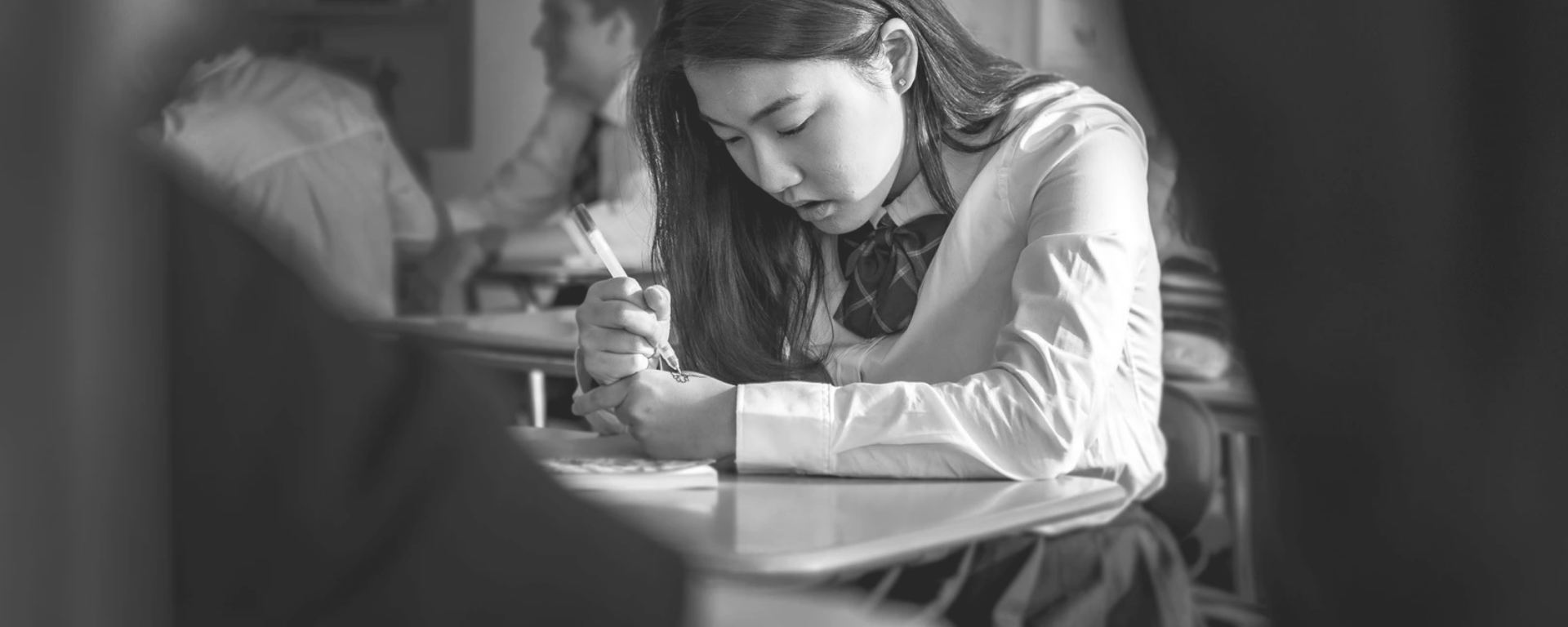 Black and white still of Judy Song as Ji Yeon Park in Kayla Yumi Lewis's "Parked In America" series pilot.